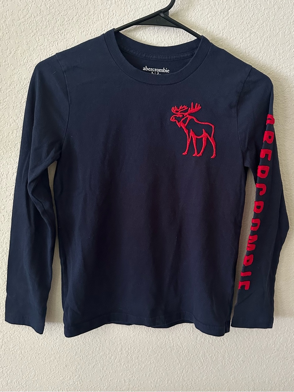 abercrombie kids navy long-sleeve tee with red moose and sleeve lettering